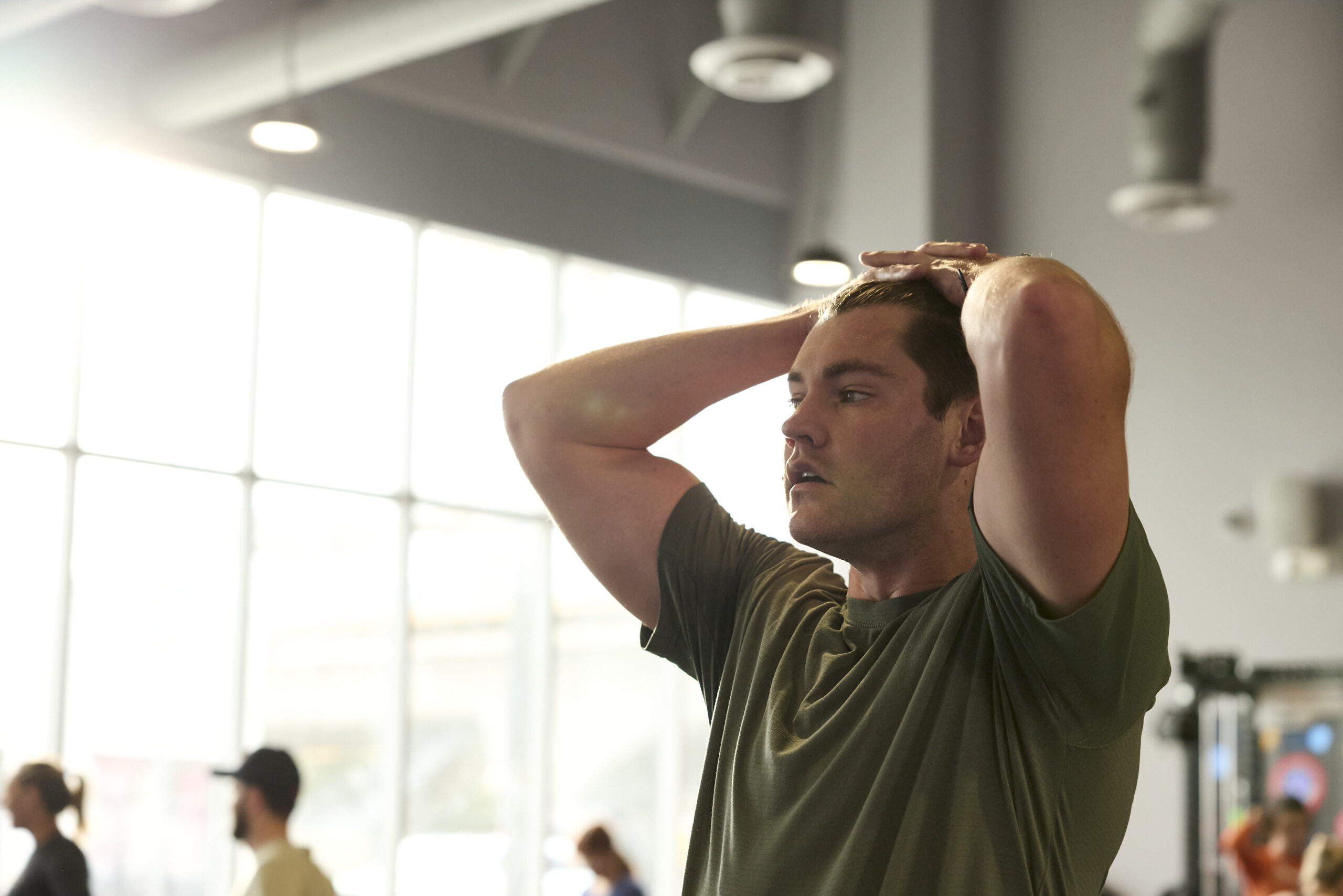 F45 coach leading a group fitness class, showcasing high-intensity functional training