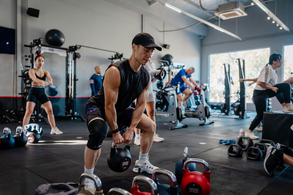 Members working out at F45 Downtown LA during a high-intensity functional training session