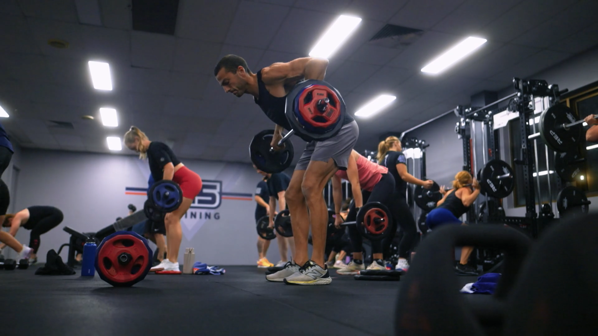 Group doing high-intensity interval training at F45 Downtown LA studio.
